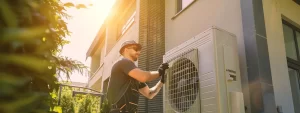 a professional hvac technician meticulously installs a sleek air conditioning unit against a backdrop of a modern residential home in bright daylight, showcasing efficiency and expertise.